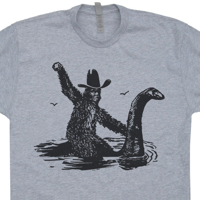 Bigfoot Sasquatch Riding The Loch Ness Monster Funny T-Shirt